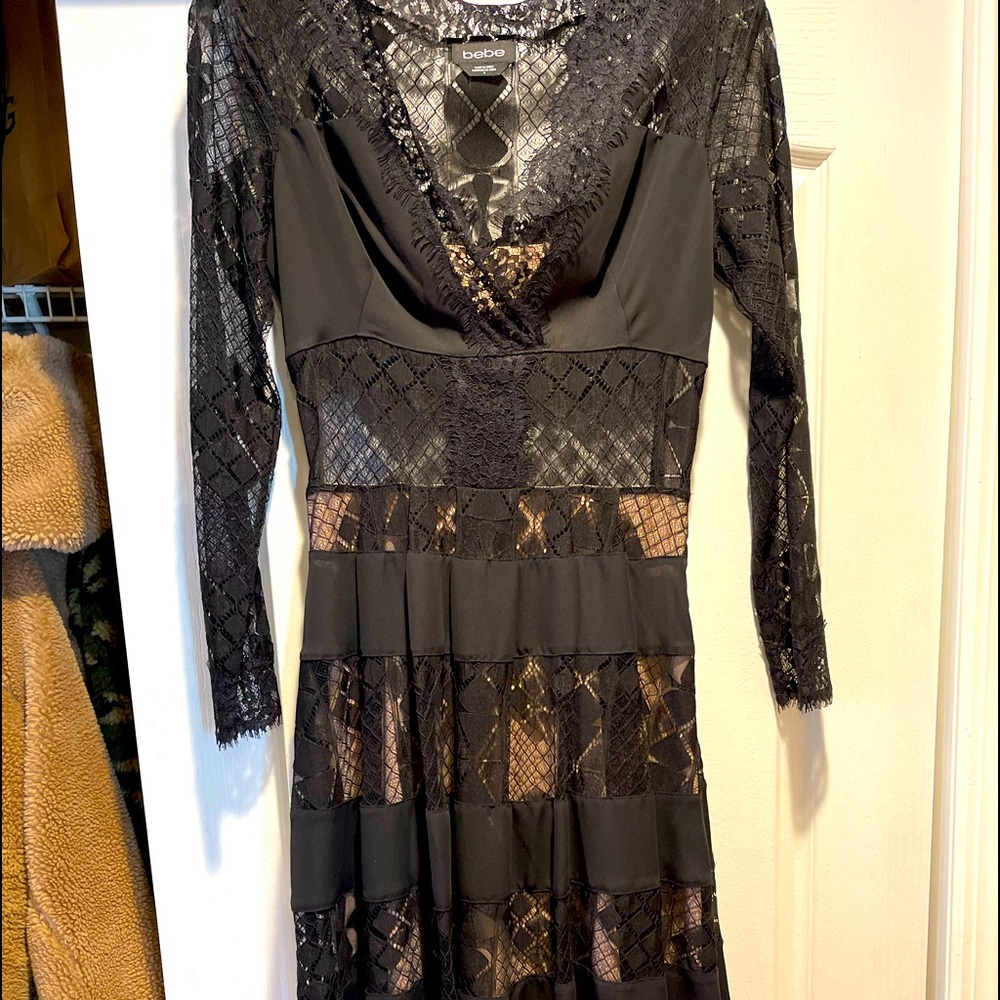 Vintage unique/a Bebe designer dress/ this dress is new & gorgeous!!!